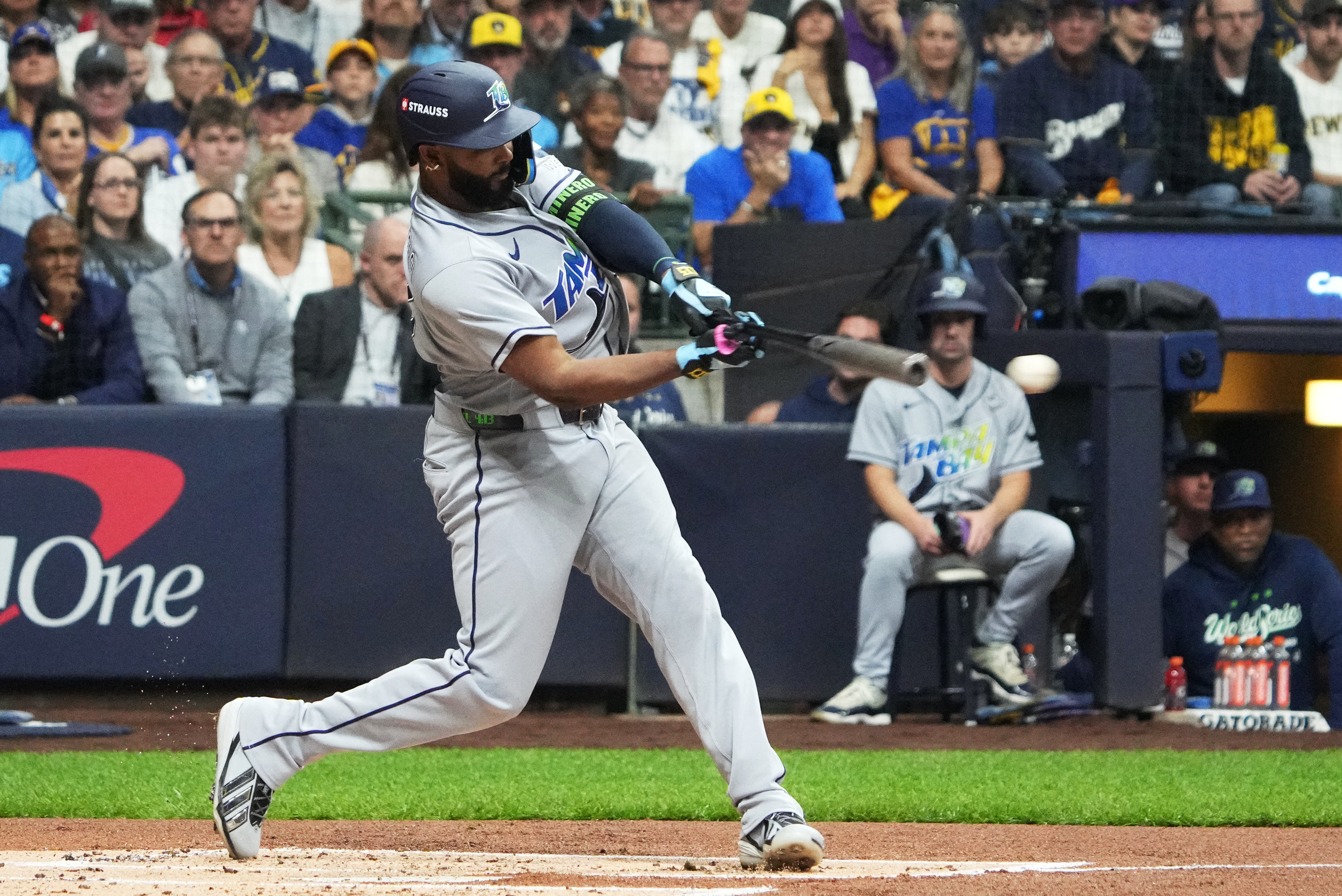 Tampa Bay Rays third baseman Junior Caminero (13) hits an RBI single against the Milwaukee Brewers during the first inning in game two of the 2026 World Series at American Family Field. 